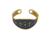 a close up of a gold and blue cuff bracelet