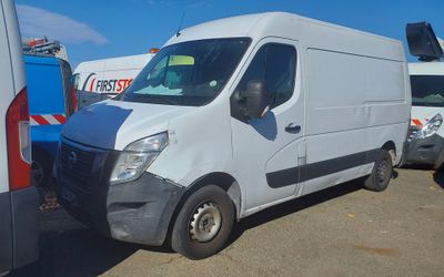 a white van that is parked in a lot