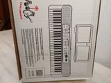 a box with a keyboard inside of it on a table