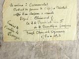 a piece of paper with writing on it sitting on a table