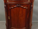 an old wooden cabinet with a marble top on a grey background