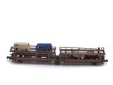 a toy train that is sitting on a white surface