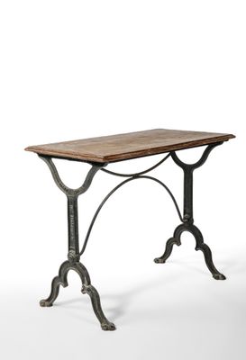 a wooden table with metal legs and a wooden top