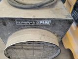 an image of a blower sitting on the floor