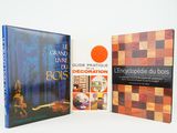 three books that are sitting next to each other on a table