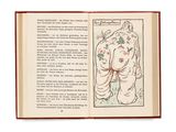 un livre ouvert dont la couverture est ornée d'un dessin représentant un éléphant