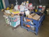 a pile of boxes and crates in a garage