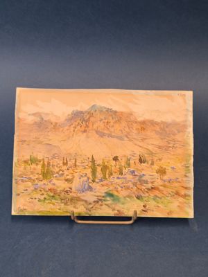 une vieille photo représentant un tableau représentant une scène désertique avec une montagne en arrière-plan