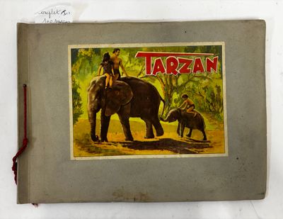 une image représentant un livre sur lequel figure l'image d'un homme chevauchant un éléphant