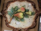a plate with fruit on it sitting in a box
