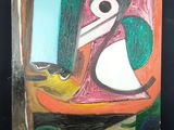 une photo d'un tableau représentant un oiseau posé sur une table