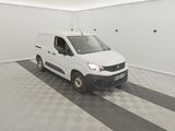 a picture of a white van parked in a garage