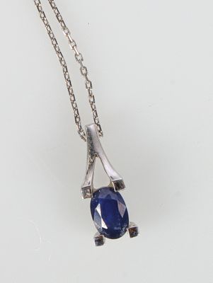 Chaîne et son pendentif en or gris orné d'un saphir. Poids brut : 2 g. - Photo 1