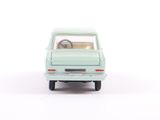 a toy car that is sitting on a white surface