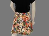 an image of a mannequin wearing a skirt with flowers on it