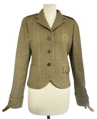 an image of a woman ' s jacket on a mannequin mannequin