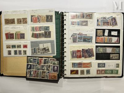 an open book with stamps on it on a table