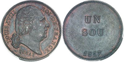 a close up of a coin with the word un sou on it