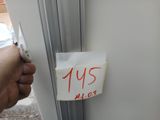 a hand that is holding a piece of paper with the number 1 us on it