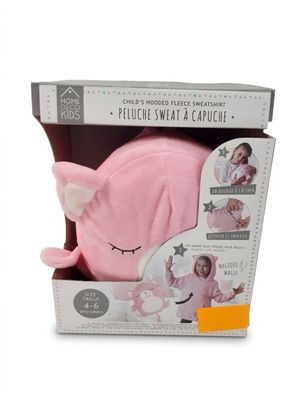 emballage d'une peluche rose dans une boîte en carton