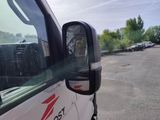 an image of a side view mirror of a truck