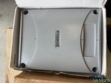 a box with a laptop inside of it on a box
