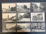an old black and white photo of a bunch of old buildings