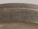 a close up of a metal pan with a lid