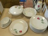 a table with a lot of plates and bowls on it
