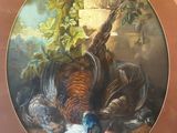 a picture of a painting of a bird on a table