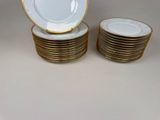 many plates stacked on top of each other on a table