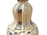 a white vase that is sitting on a table