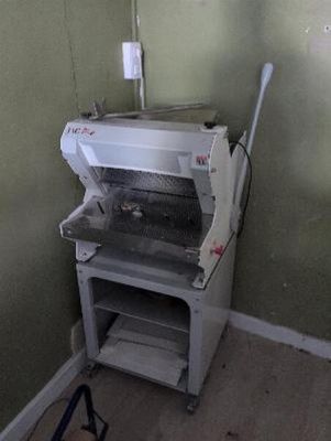 a machine that is sitting in the corner of a room