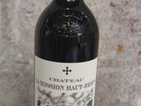 a bottle of wine that is sitting on a table