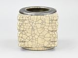 a close up of a vase with a cracky surface on it