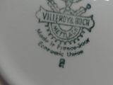 a close up of a plate with a logo on it