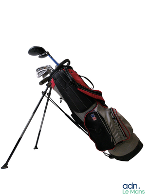 a picture of a golf bag and clubs on a tripod