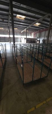 a large room with a lot of stalls in it