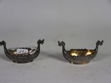 pair of silver plated bowls with handles and handles