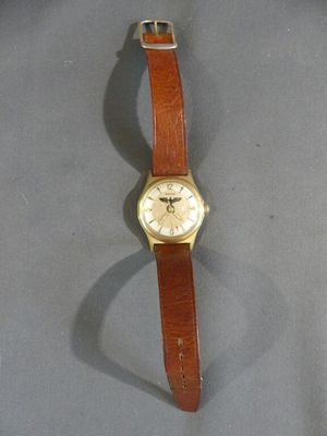 a watch that is on display on a table