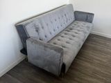 a couch that is sitting in the corner of a room