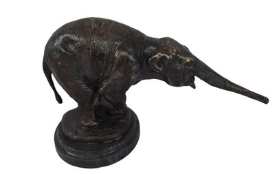 a statue of an elephant that is standing on a pedestal