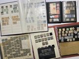 many different types of stamps on the pages of a book