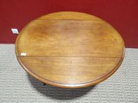 Table ovale en bois naturel à 2 volets. (photo 5)