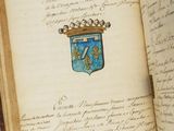 un livre ouvert sur lequel figure un dessin représentant des armoiries surmontées d'une couronne