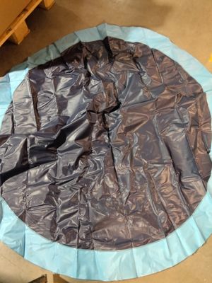 a picture of a blue and brown blanket on the floor