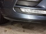 a close up of the front bumper of a car