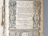 an old book with a picture of a man and a woman on it