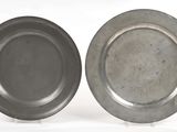 pair of silver plate on stand on white background