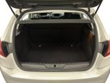the back of a car with the trunk open showing the trunk space